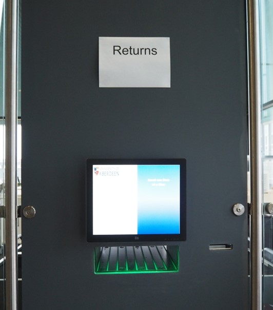 A photo of the Returns Room slot on the ground floor interior of the Sir Duncan Rice Library.